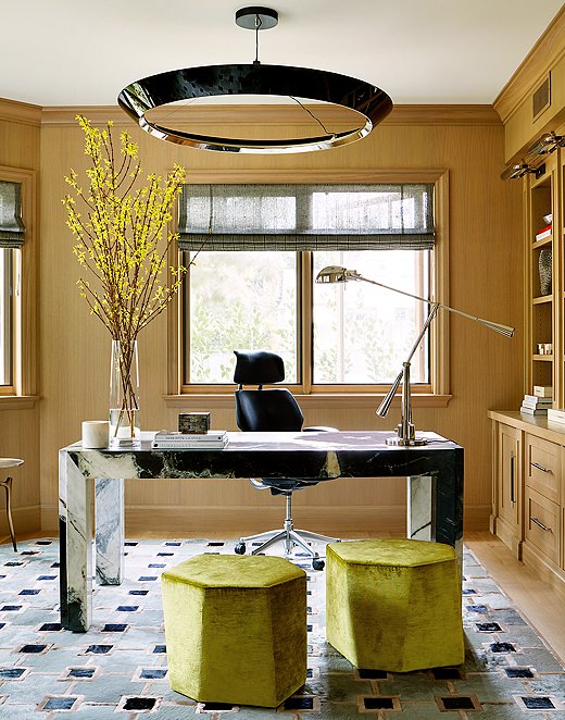 Though this home office is in Santa Monica, the owners wanted it to reflect their New York roots and sensibility. The sharp angles, crisp lines, and chrome details pay tribute to the Art Deco finesse of the Empire State Building and the Chrysler Building. The pale wood, though, is in keeping with California ease. Room by Adam Hunter; photo by Trevor Tondro. View the rest of the home here.
